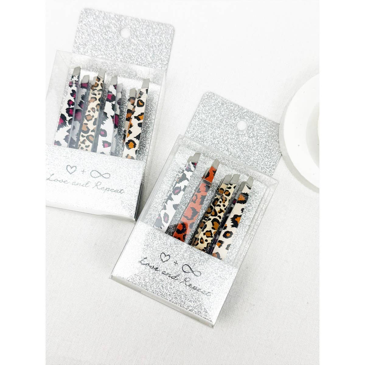 MIX COLOR Professional Leopard Eyebrow Tweezer for wholesale on Faire3