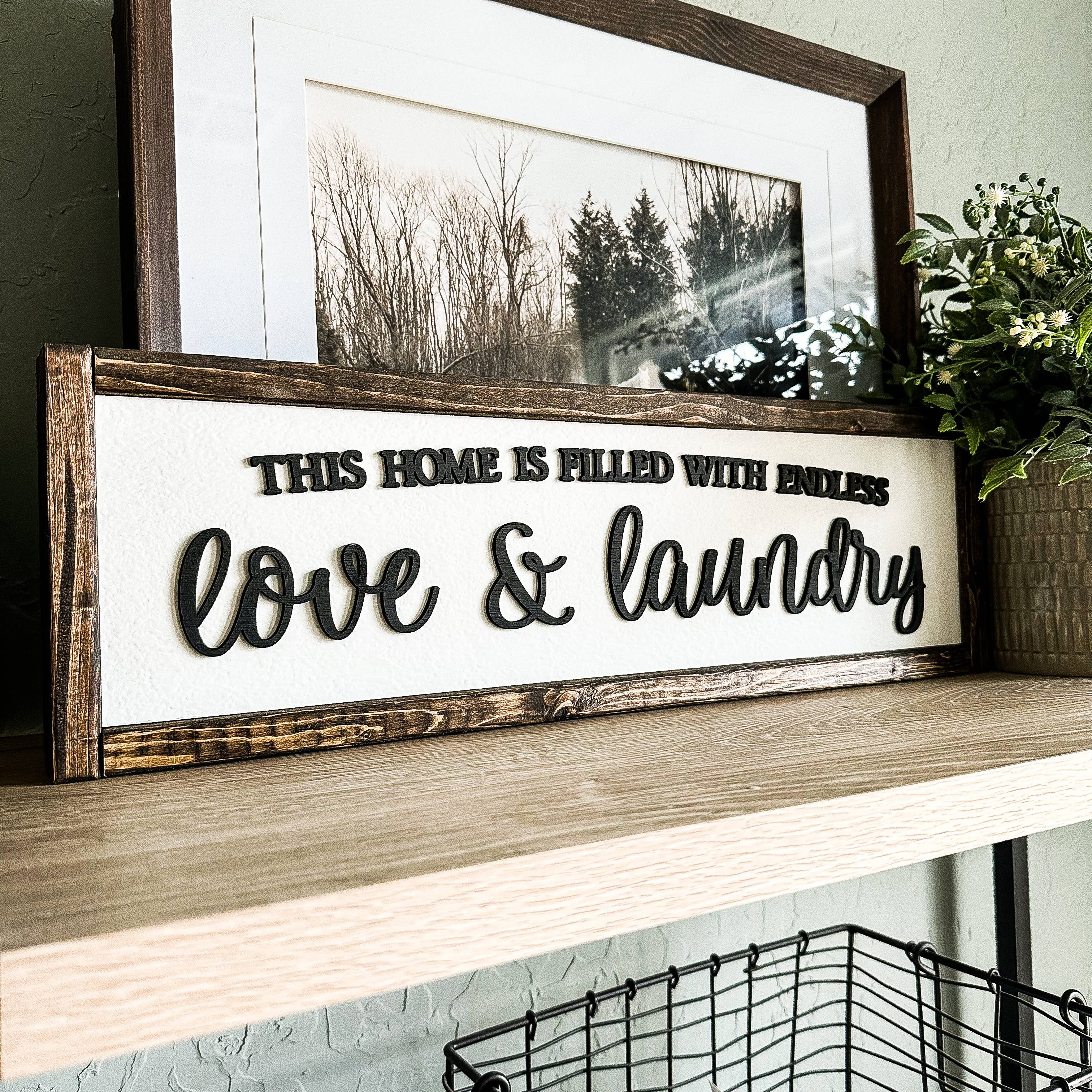 Dakota + Pine Design Co. – wholesale Sign – This Home Is Filled With Love And Laundry Sign2