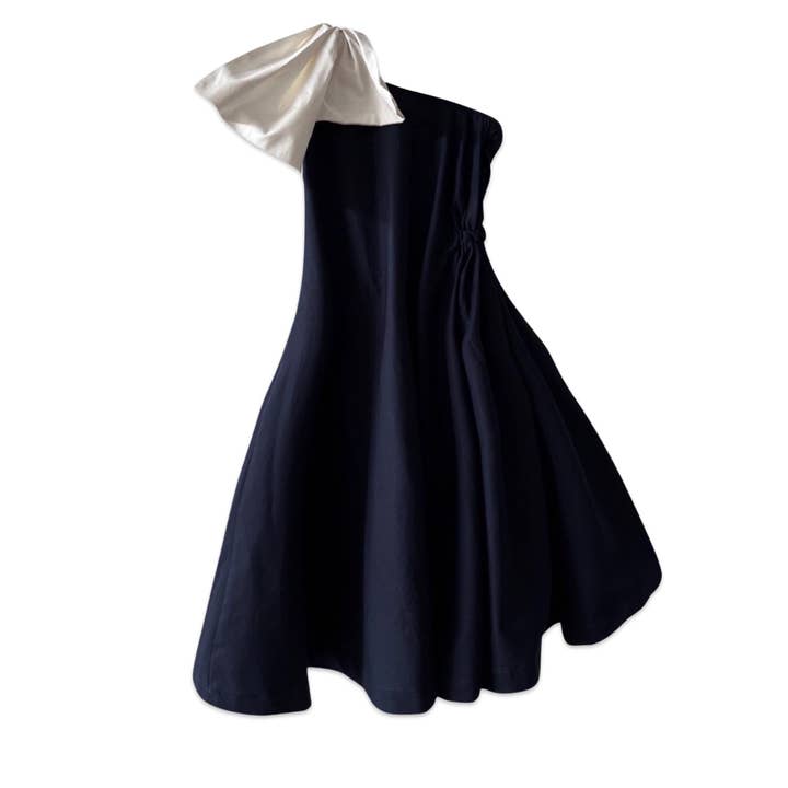 Navy Cloche Dress With One Shoulder White Bow for wholesale by London Atelier Byproduct