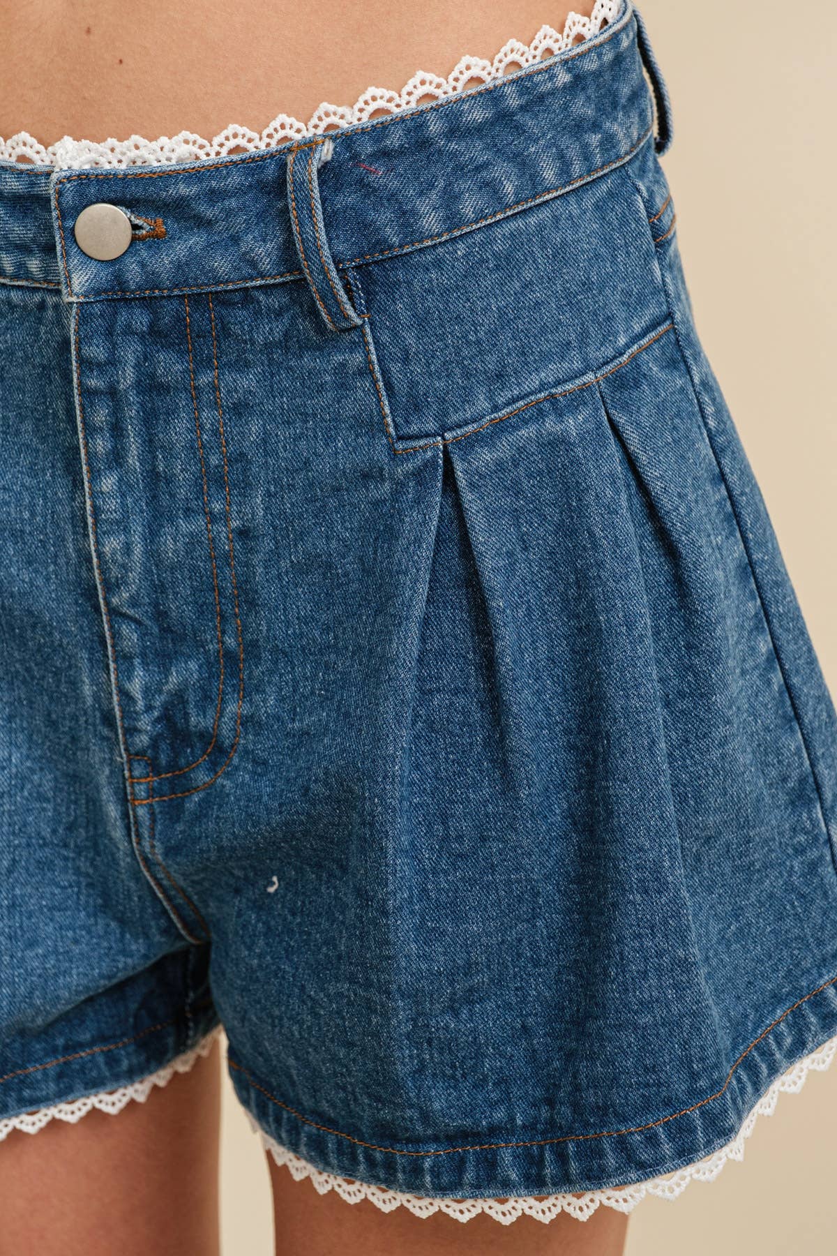 CP13470A - LACE TRIM PLEATED DENIM SHORTS for wholesale on Faire6
