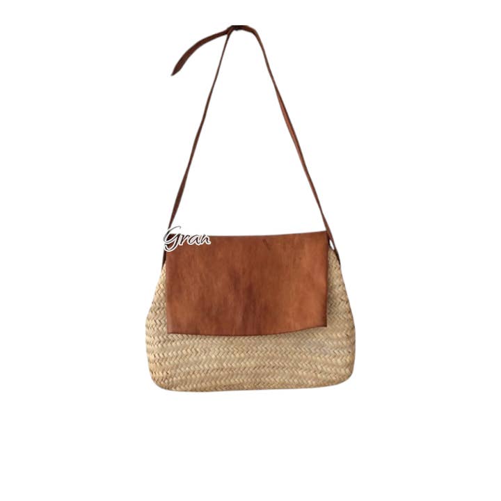Handcrafted Straw Crossbody Bag with Leather Flap for wholesale by Gran Wholesale