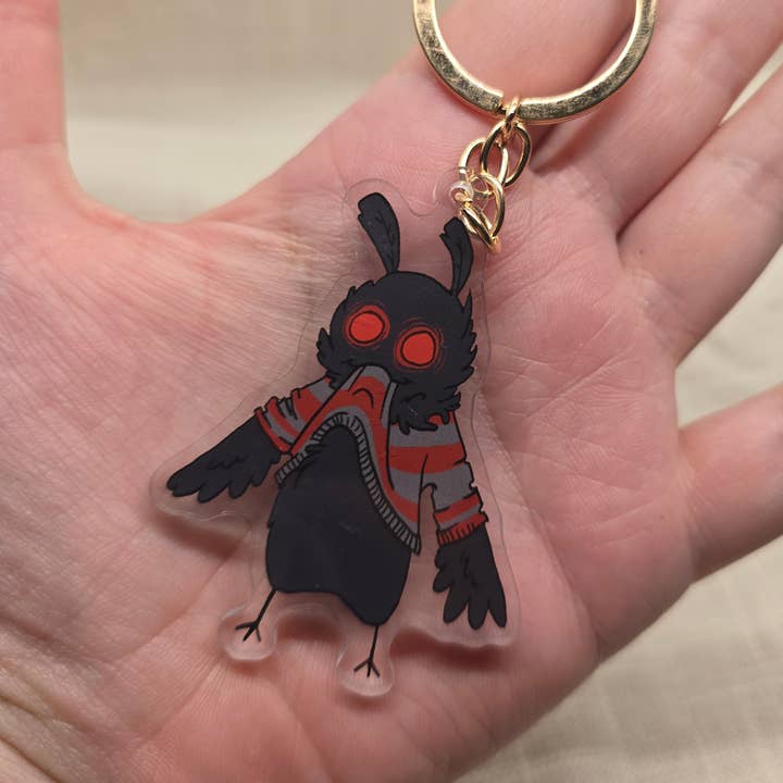 Mothman a Comer o Seu Próprio Porta-chaves de Camisola por atacado de Salt Birch