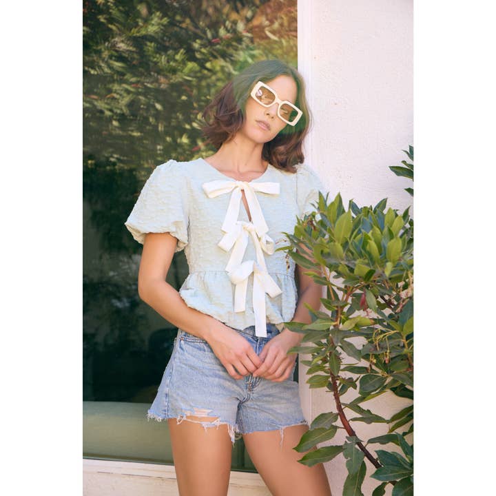 idem ditto - Wholesale Blouse - Women's - BUBBLE PEPLUM TOP WITH TEXTURED FABRIC AND BOW