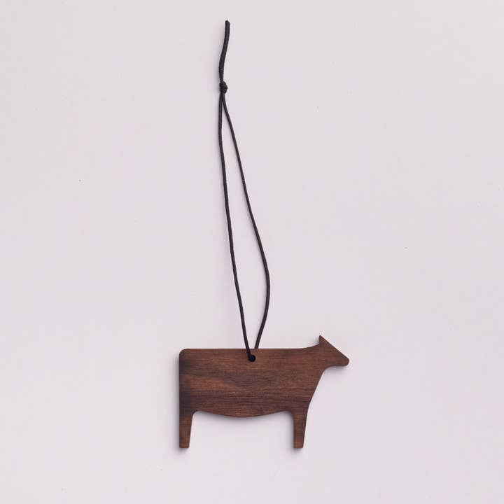 Collin Garrity – wholesale Prydnad – Ko prydnad/Presentetikett