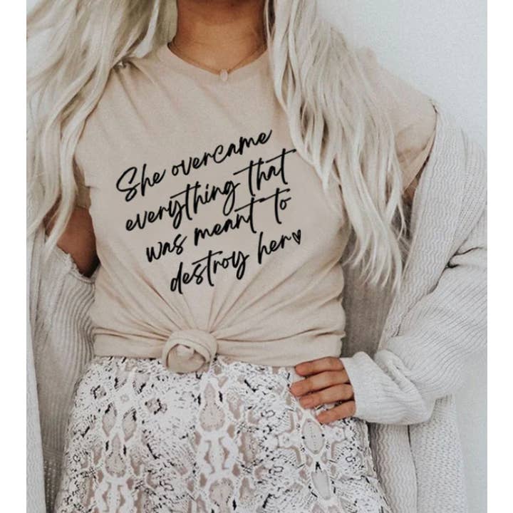 Elle a surmonté un t-shirt graphique, un t-shirt pour la santé mentale. pour la vente par The Intentional Shop