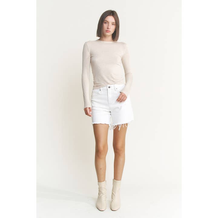 MISTY WHITE HIGH RISE DISTRESSED FRAYED HEM SHORTS for wholesale on Faire