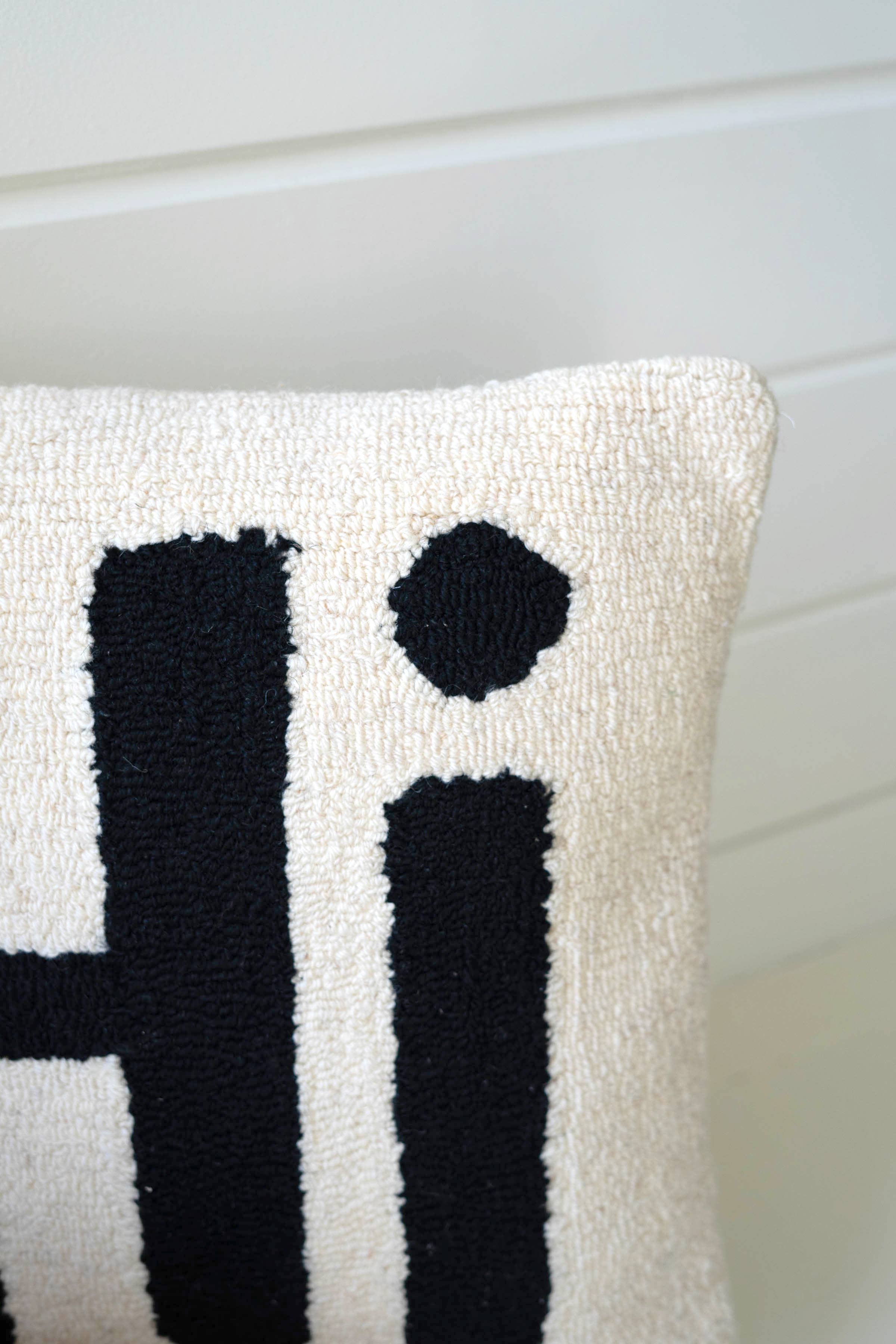 Black “Hi” HAND-HOOKED PILLOW for wholesale on Faire2