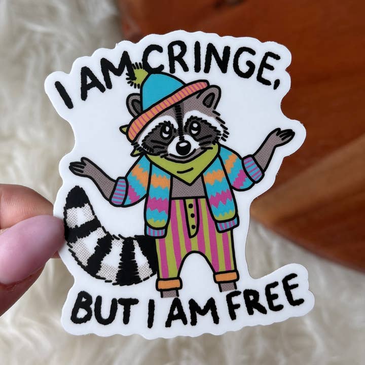 "I am cringe, but I am free" Funny Raccoon Sticker for wholesale by Big Moods