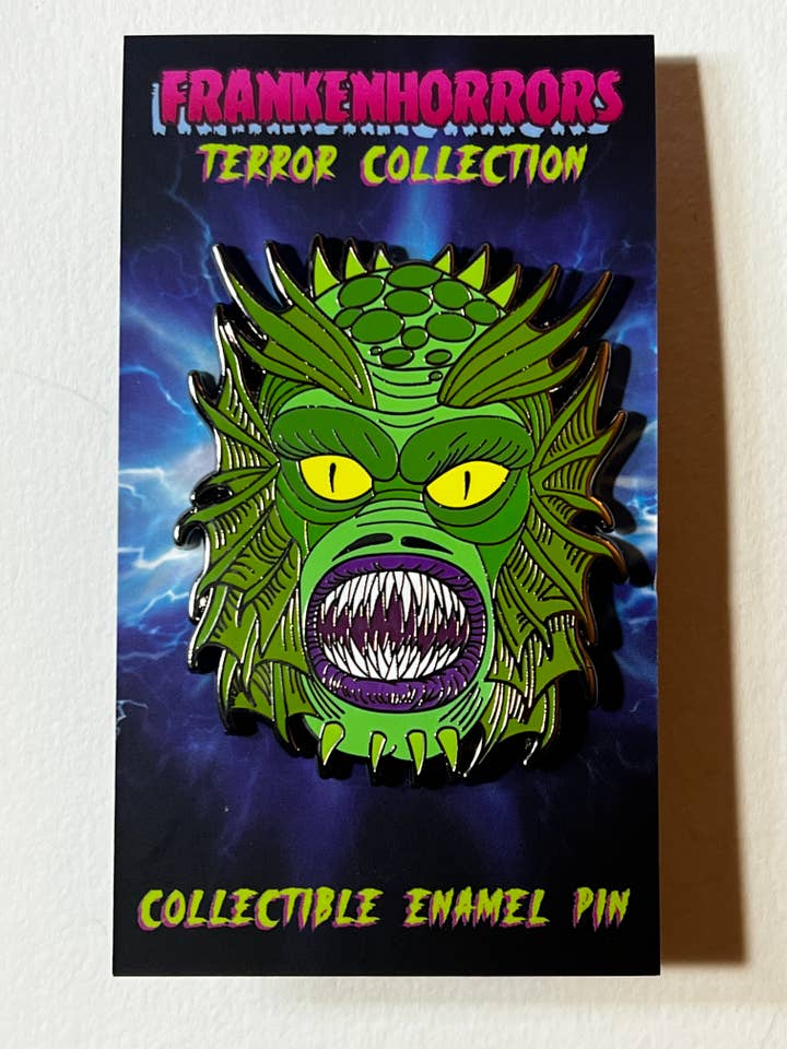 Frankenhorrors Swamp Beast 2" Hard Enamel Pin Horror Comics for wholesale by Xeno Pop