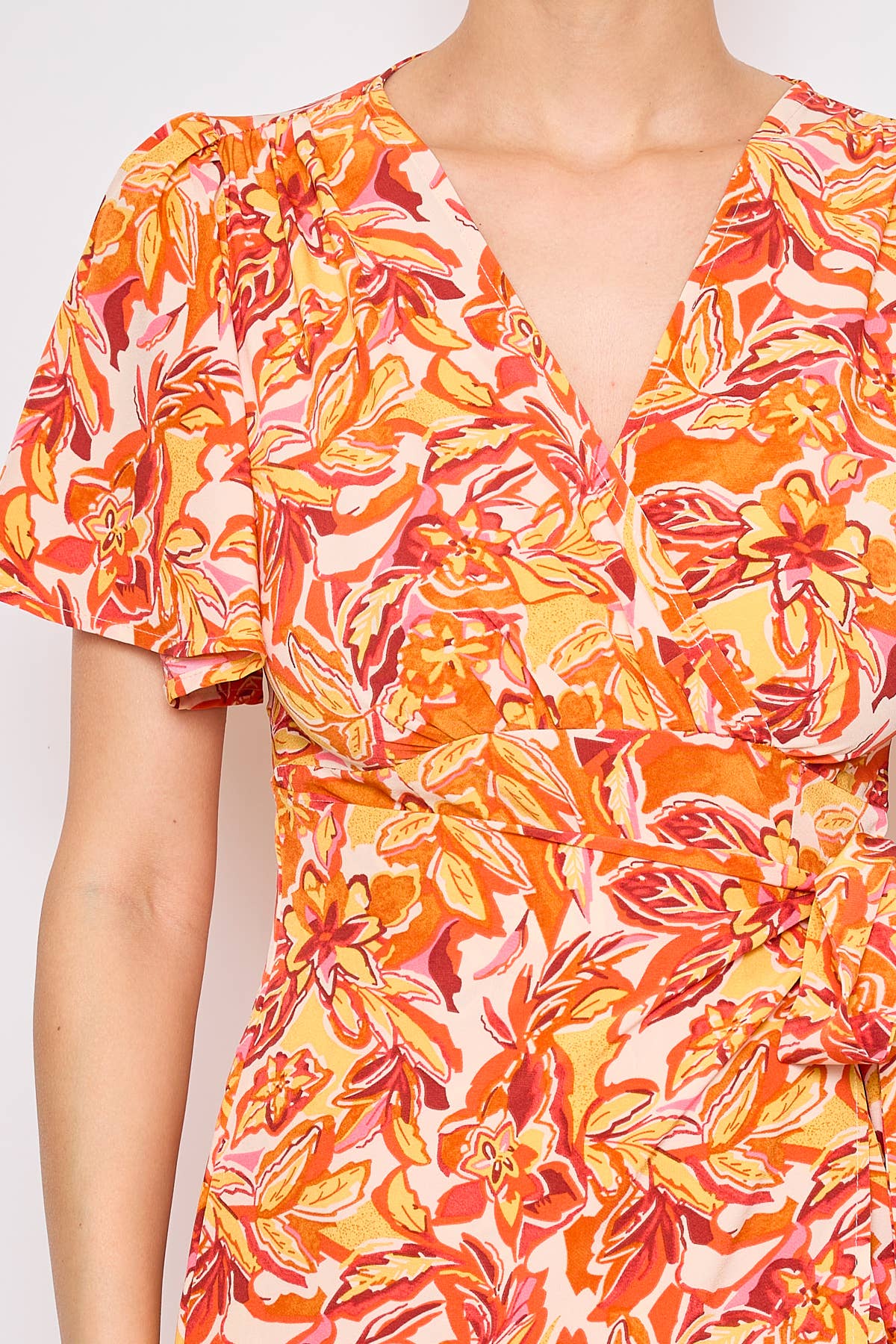 Orange Short wrap summer dress with floral print for wholesale on Faire4