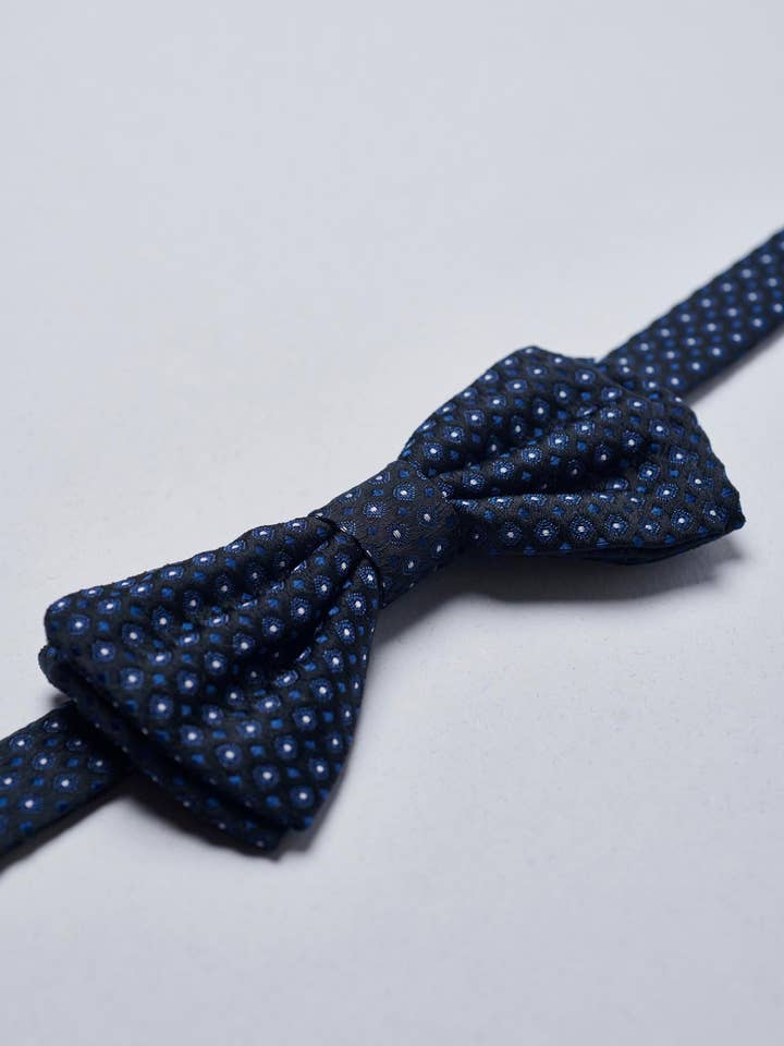 Blauwe vlinderdas met gestippeld patroon voor wholesale door Angelico