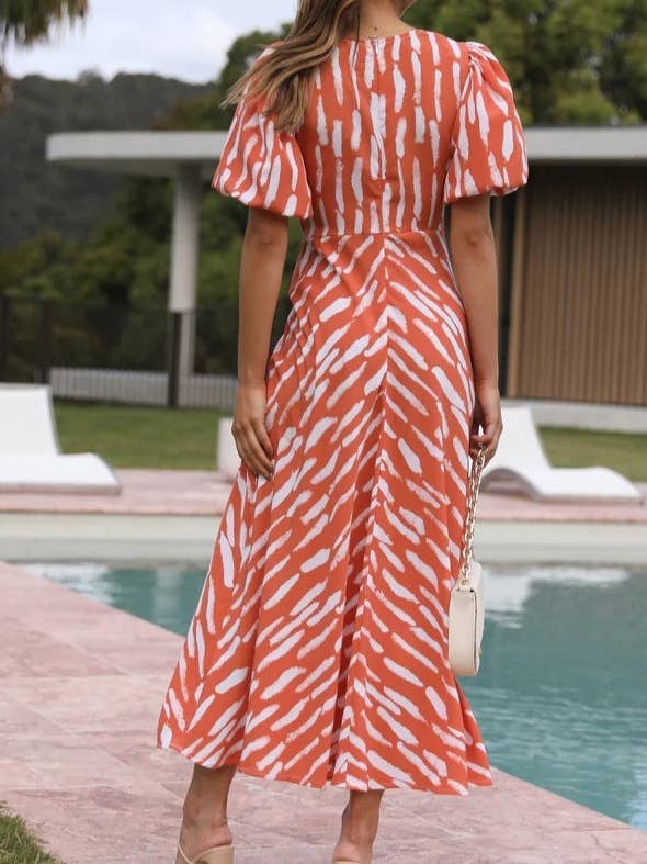 Rosa Clothing - Wholesale Dress - Women's - zebra print plunge twist front cutout puff sleeve dress5