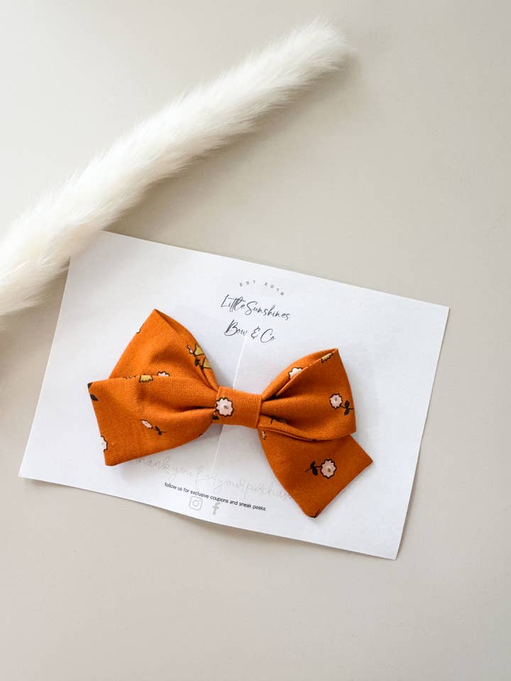 Burnt Orange & Gold Flowers Pinwheel Hair Bow for wholesale by Little Sunshines Bow & Co