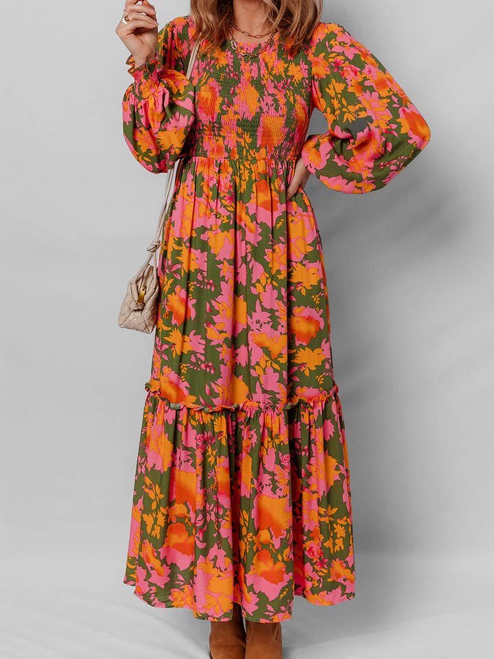 Orange Orange blommig klänning med puffärmar, smockad liv och volanger. för wholesale på Faire8