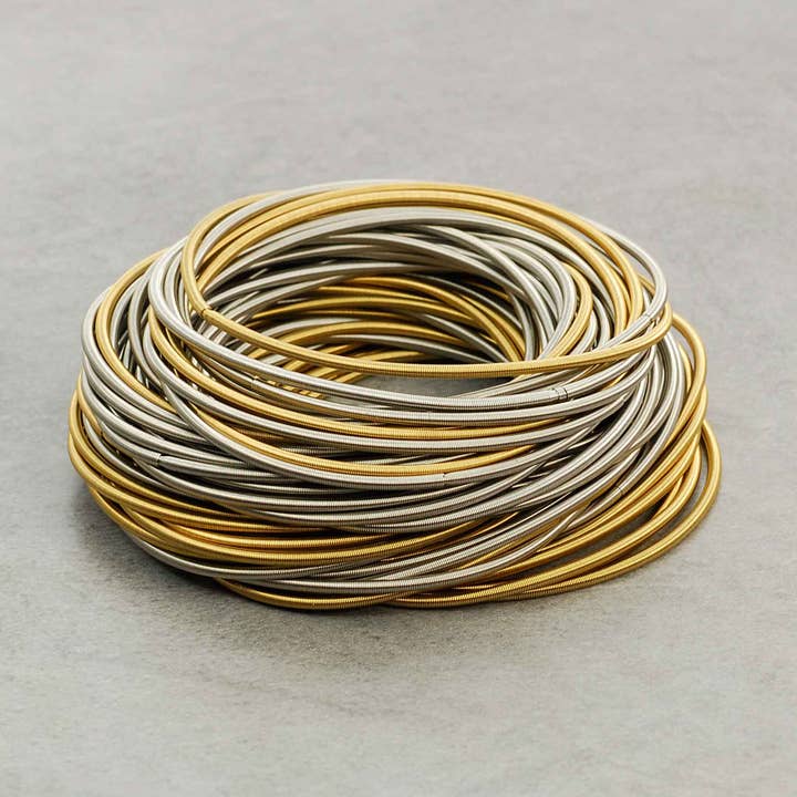 Stainless steel spring bracelet set for wholesale by Merveilles du Monde