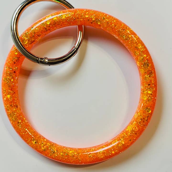 Endast glittrande glitter orange nyckelringsarmband för wholesale av Shop Drip Express