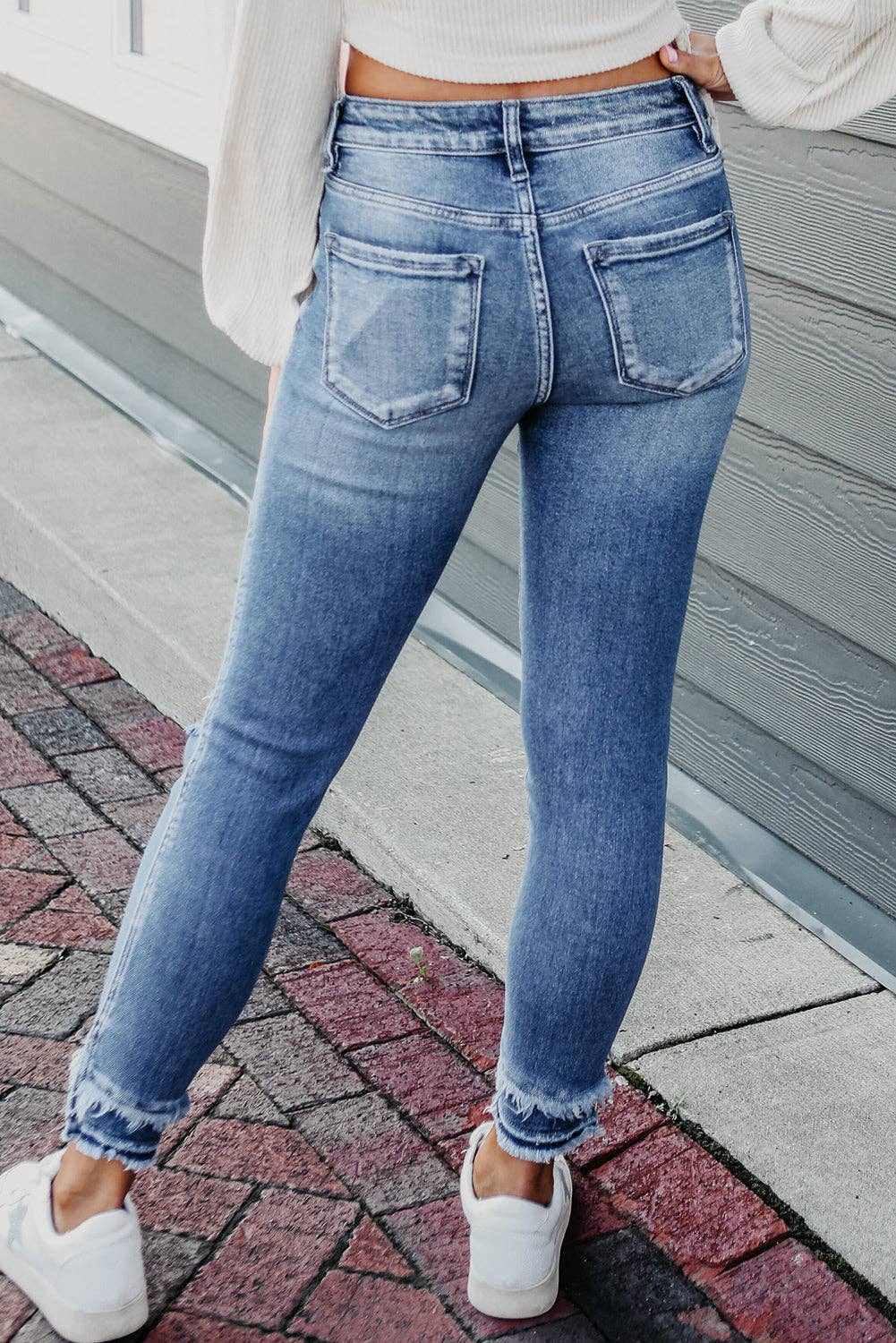 Light Blue Macie Distressed Frayed Ankle Skinny Jeans for wholesale on Faire1