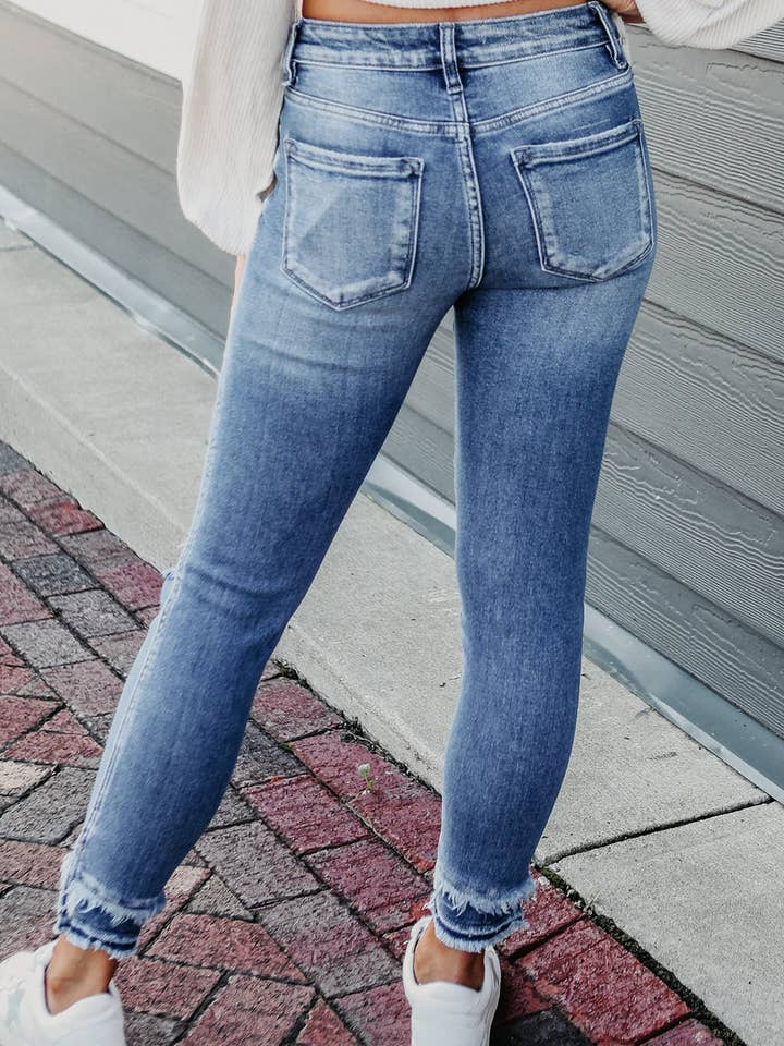 Light Blue Macie Distressed Frayed Ankle Skinny Jeans for wholesale on Faire1