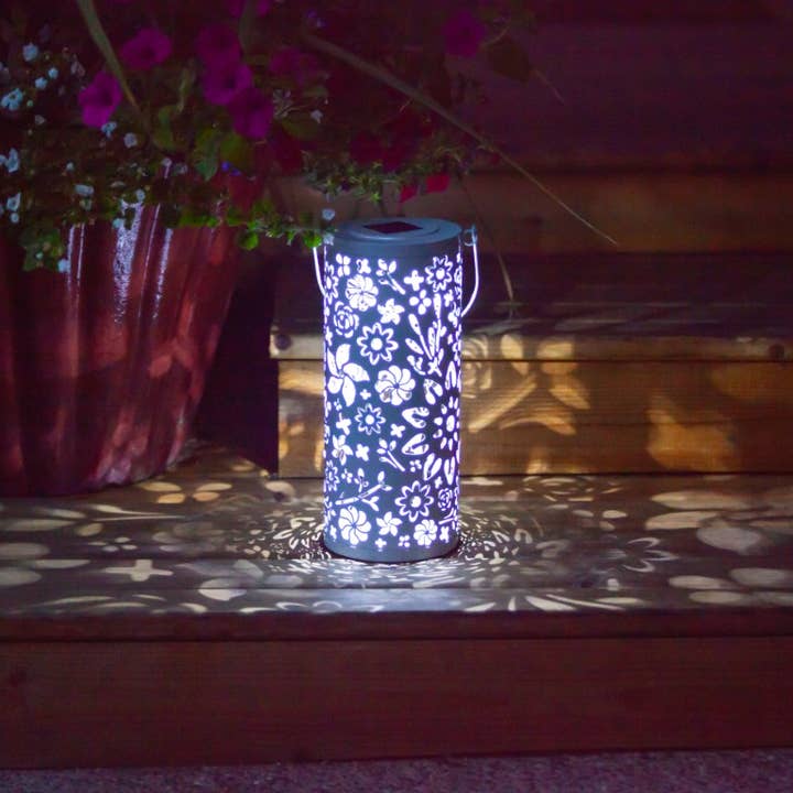 Metal Bloom 12" Outdoor Solar Lantern - White and other Purchase Wholesale luminarias. Free Returns & Net 60 Terms on Faire trending on Faire.