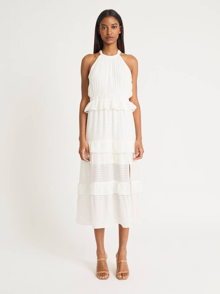 TIERED RUFFLE HALTER WITH SLIT för wholesale av Maggy London Group