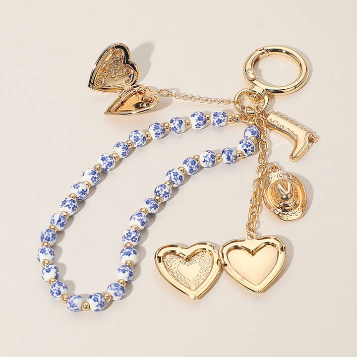 Sensibling Corp. - Wholesale Keychain - Women's - Heart Locket Cowboy Ceramic Ball Wristlet Keychain Bag Charm