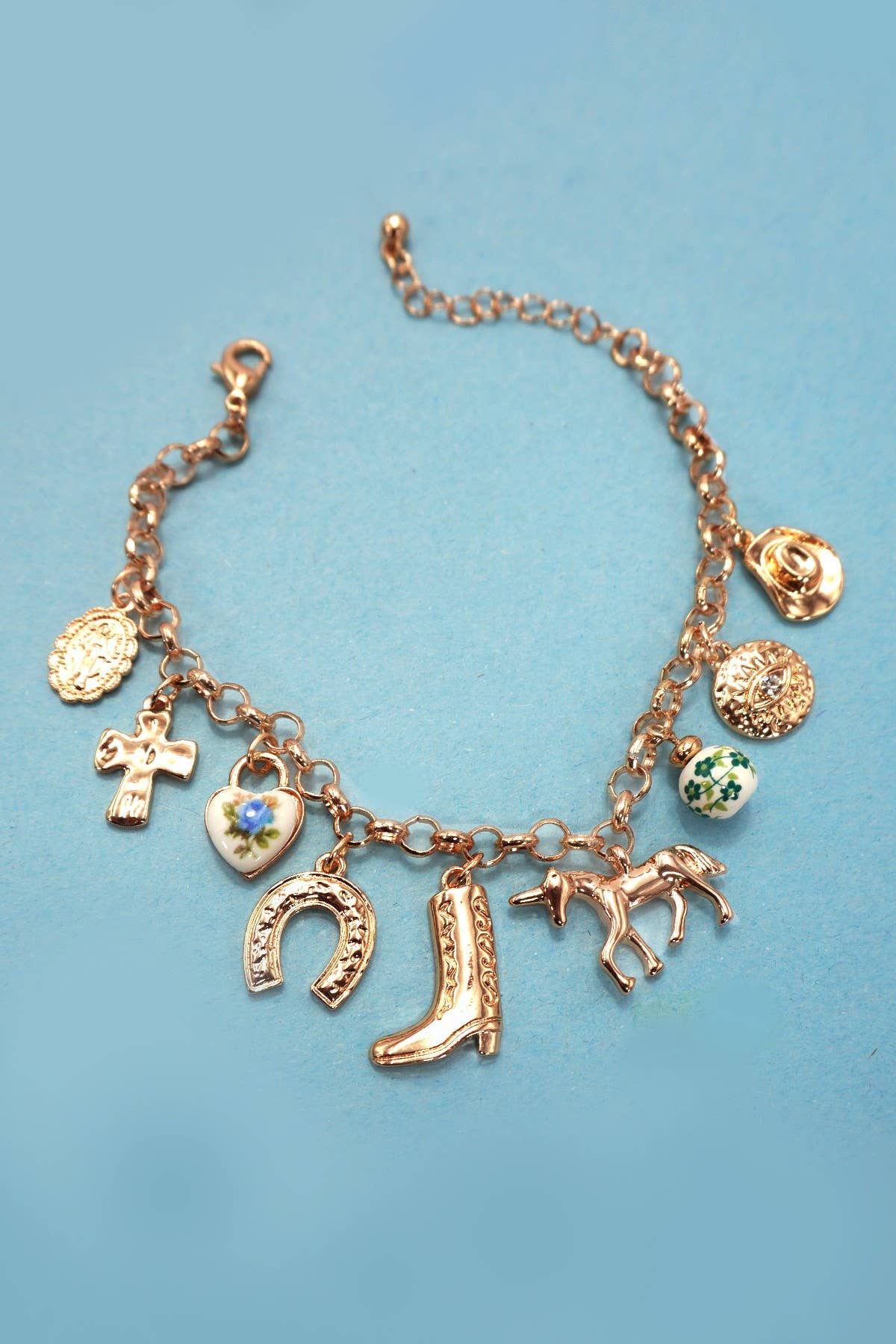 GOLD CHARM BRACELET - WESTERN BOOT CROSS PORCELAIN | 80B1345 for wholesale on Faire1
