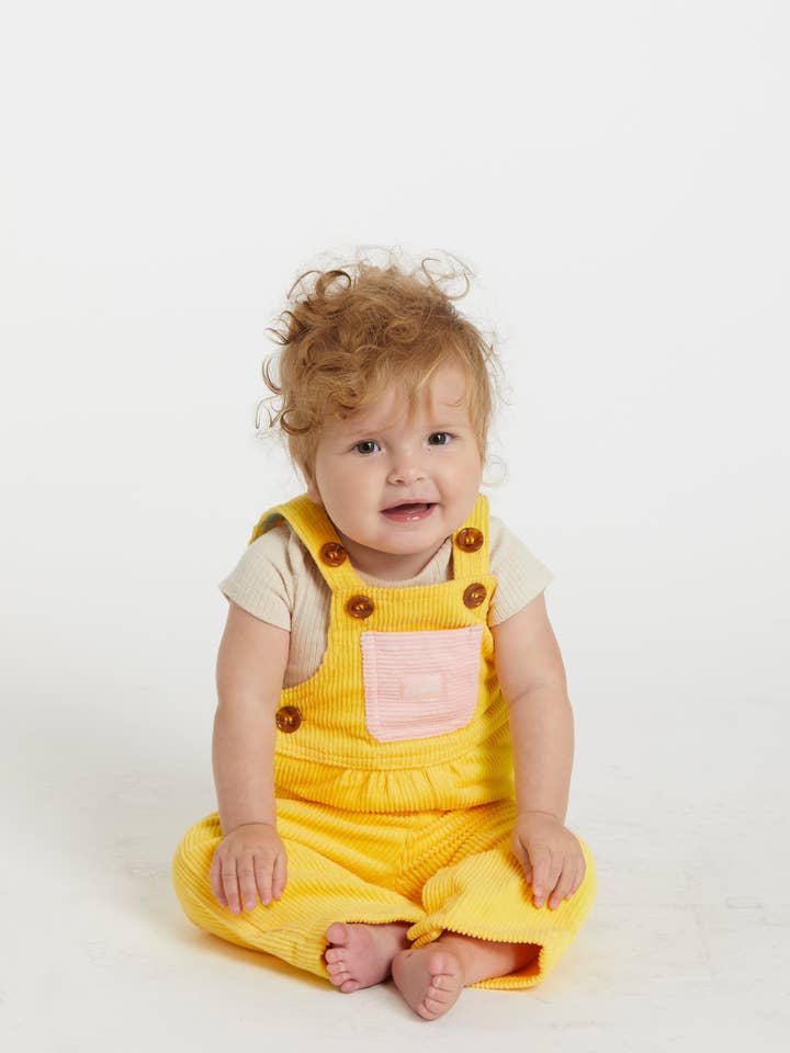 Macacão Infantil (Amarelo/Rosa Claro) por atacado de Hammies