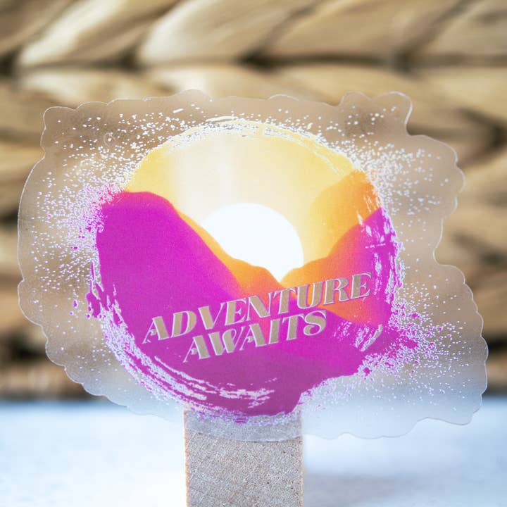 Savannah and James Co - Wholesale Sticker - Adventure Awaits, Sunset Clear Vinyl Sticker, 3in.5