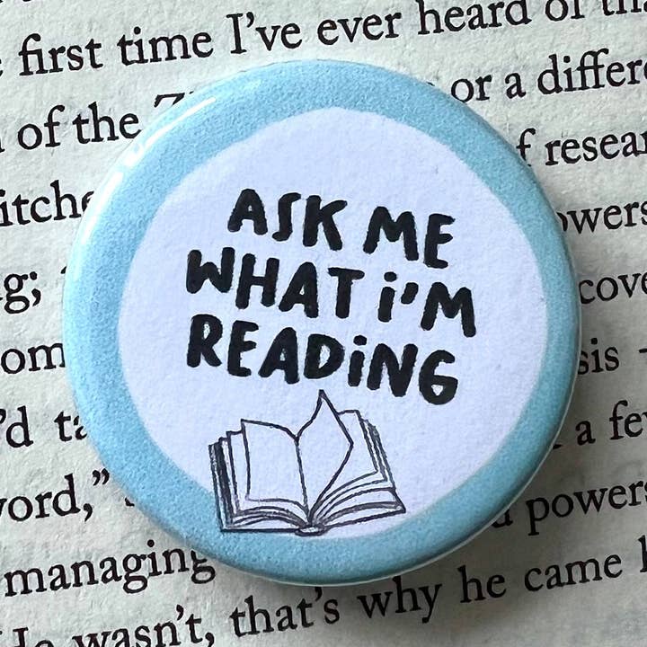 Ask Me What I'm Reading Pin Badge - Book Lover Gift (38mm) for wholesale by Fynedesignshop