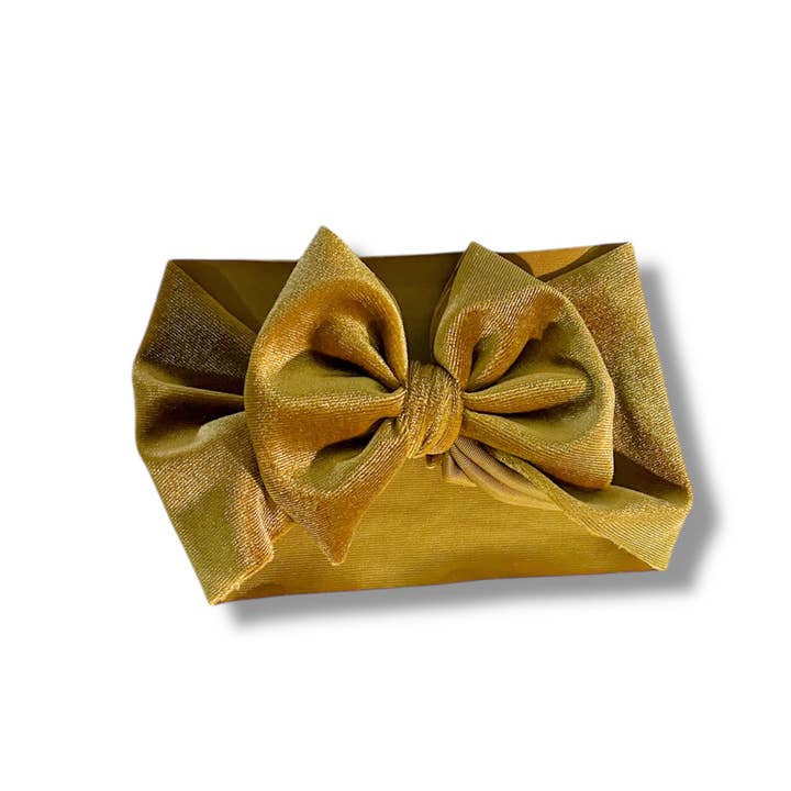 Guld sammet baby pannband rosett för wholesale av Tiny toes Baby Co