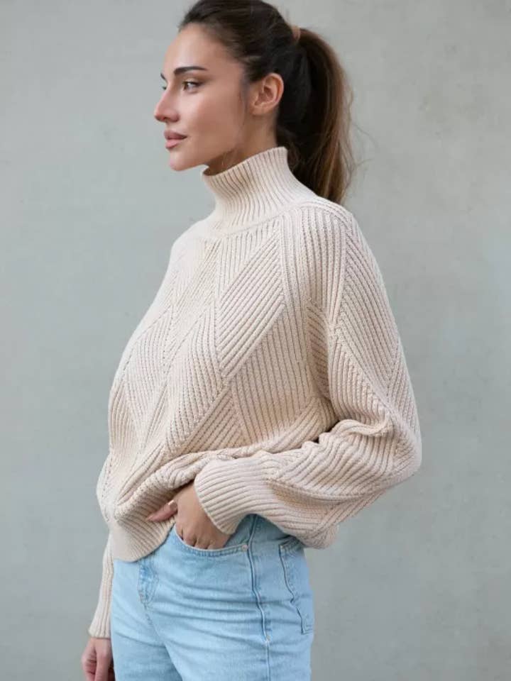 High Neck Knitted Sweater With Geometric Print and other Purchase Wholesale sweaters. Free Returns & Net 60 Terms on Faire trending on Faire.