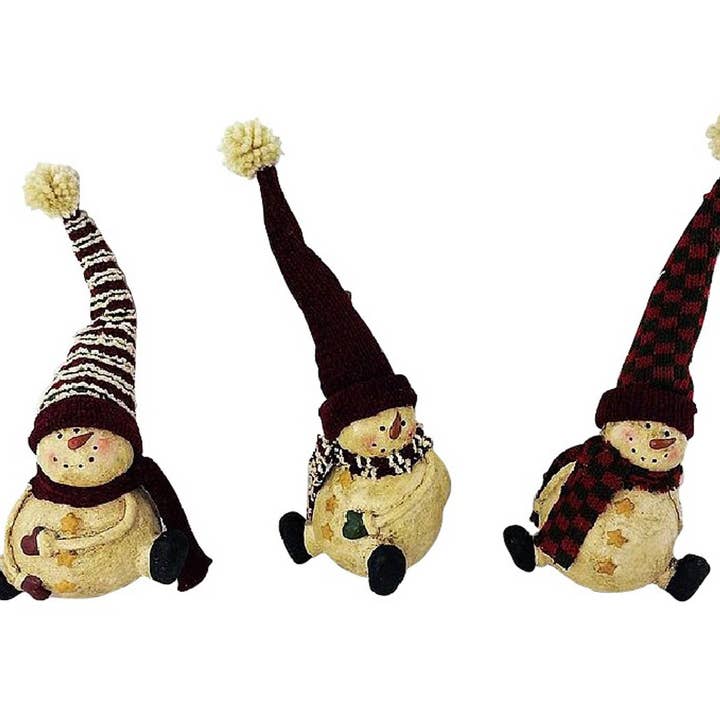 Paper Mache Snowmen with Fabric Hats, Scarfs and Candy Cane Letters, Sitting, Assorted, Set of 3 - 10" Tall for wholesale by Birch Maison