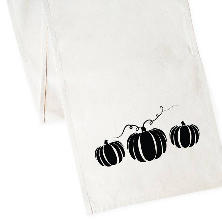 Pumpkin Graphic Table Runner and Holiday Party Decoration for wholesale by The Cotton & Canvas Co.