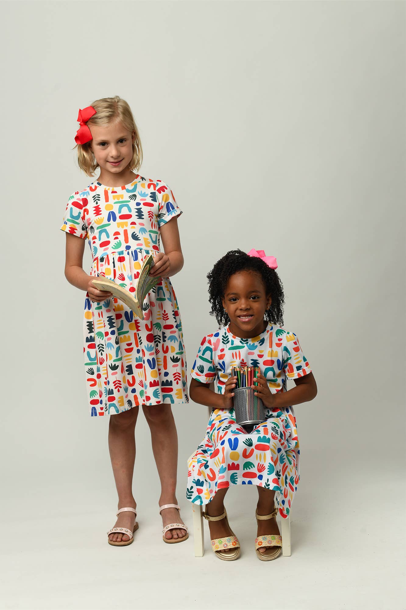 Minna - Wholesale Dress - Kids -  Short Sleeve Jersey Twirl Dress - Colorful Retro Shapes4