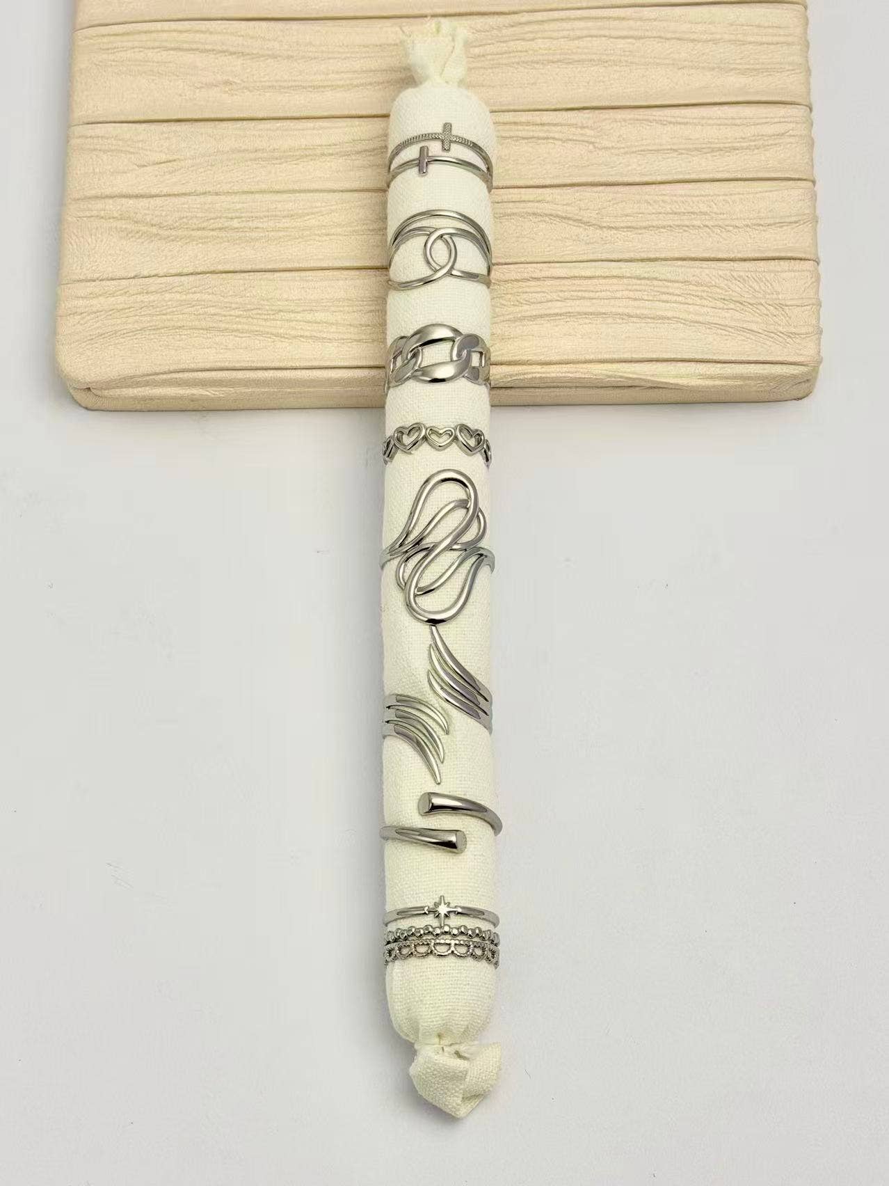 COSMOS - Wholesale Jewelry Set - Set of 8 Adjustable Silver Rings with Modern Design in Steel1