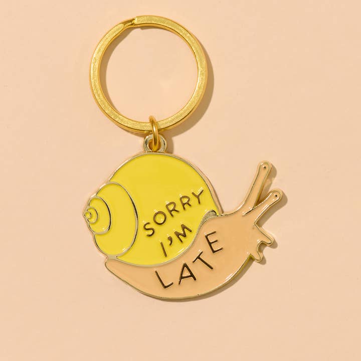 Sorry I'm Late Enamel Snail Keychain, Bag Charm for wholesale by And Here We Are
