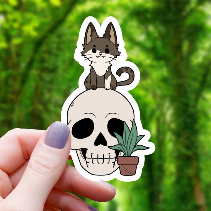 Cat Sitting on Skull with Houseplant Sticker - 3" for wholesale by Mimic Gaming Co