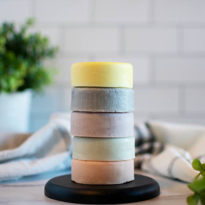 Solid Conditioner Bars in Travel Tin for wholesale by True Roots Collaborative
