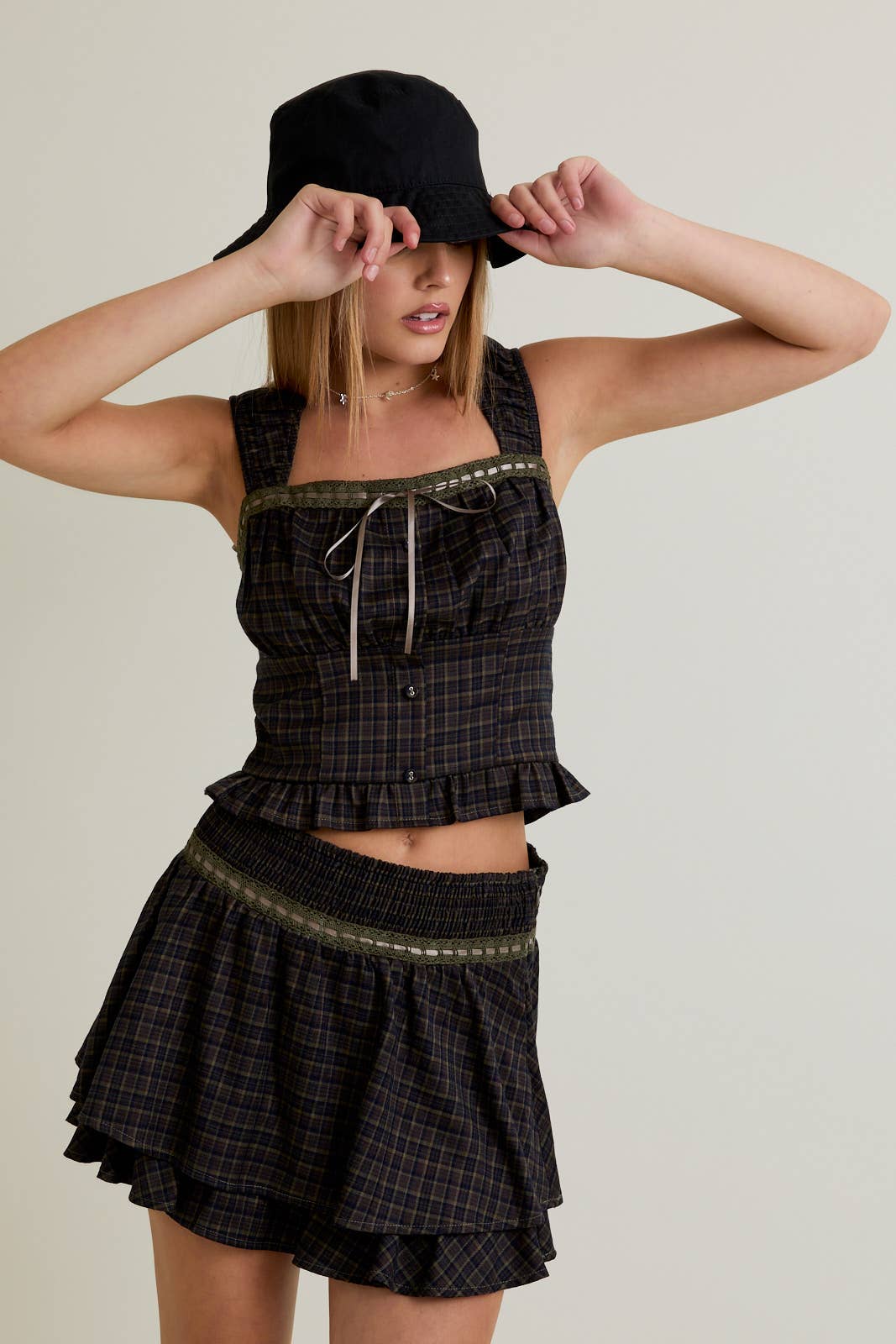 OLIVE NAVY PLAID SLEEVELESS TOP WITH TRIM DETAIL WITH MID RISE SKIRT for wholesale on Faire0