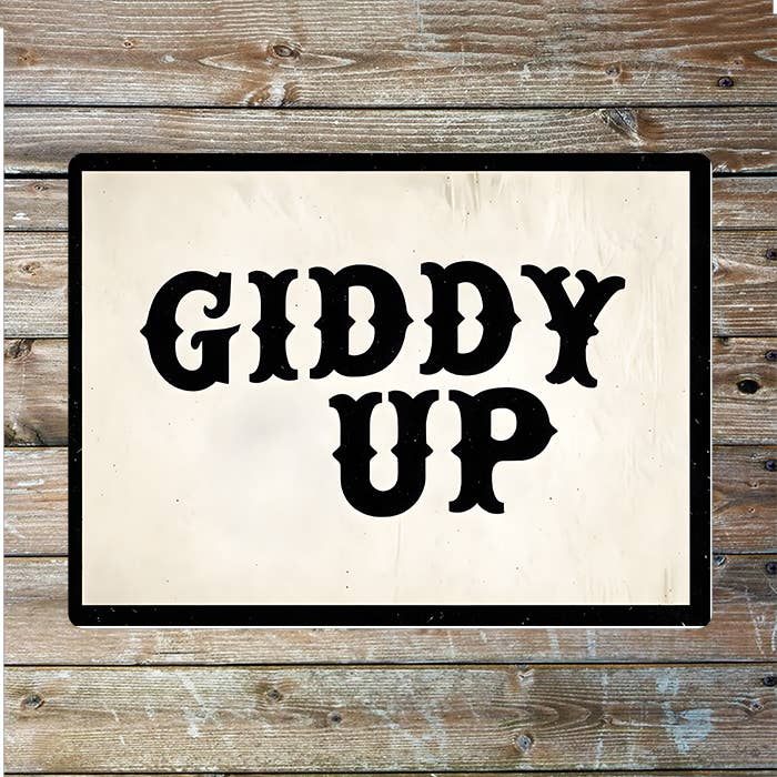 The British Metal Signs Company - Vendita all'ingrosso Cartelli - Targa in Metallo Arte Western Cowboy "Giddy Up"0
