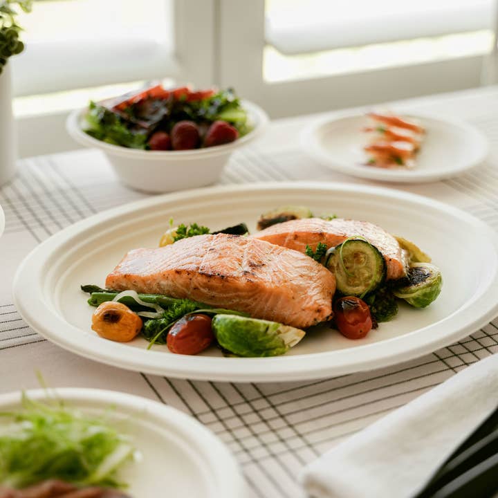 White CaliWare 10" No PFAS Added Natural Bagasse Plate - 500/Case for wholesale on Faire