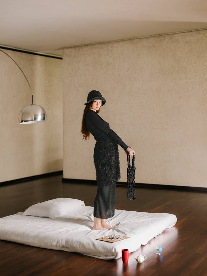 Black Glitter Ribbed V Neck Top for wholesale on Faire3