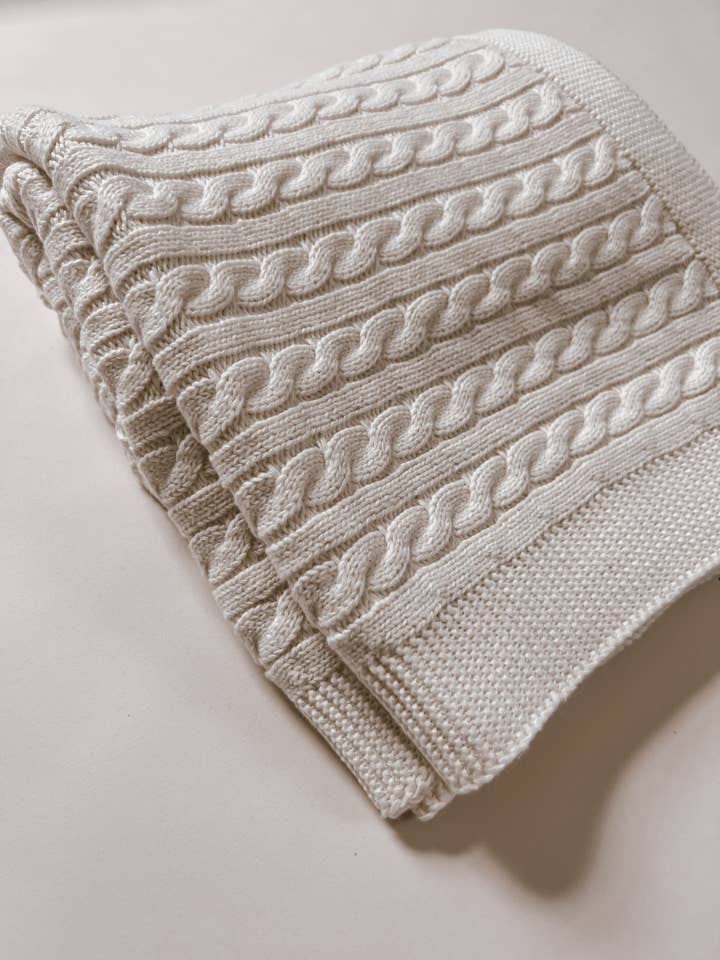 Luna + Luca Cable Knit Baby Blanket - White for wholesale by Luna + Luca