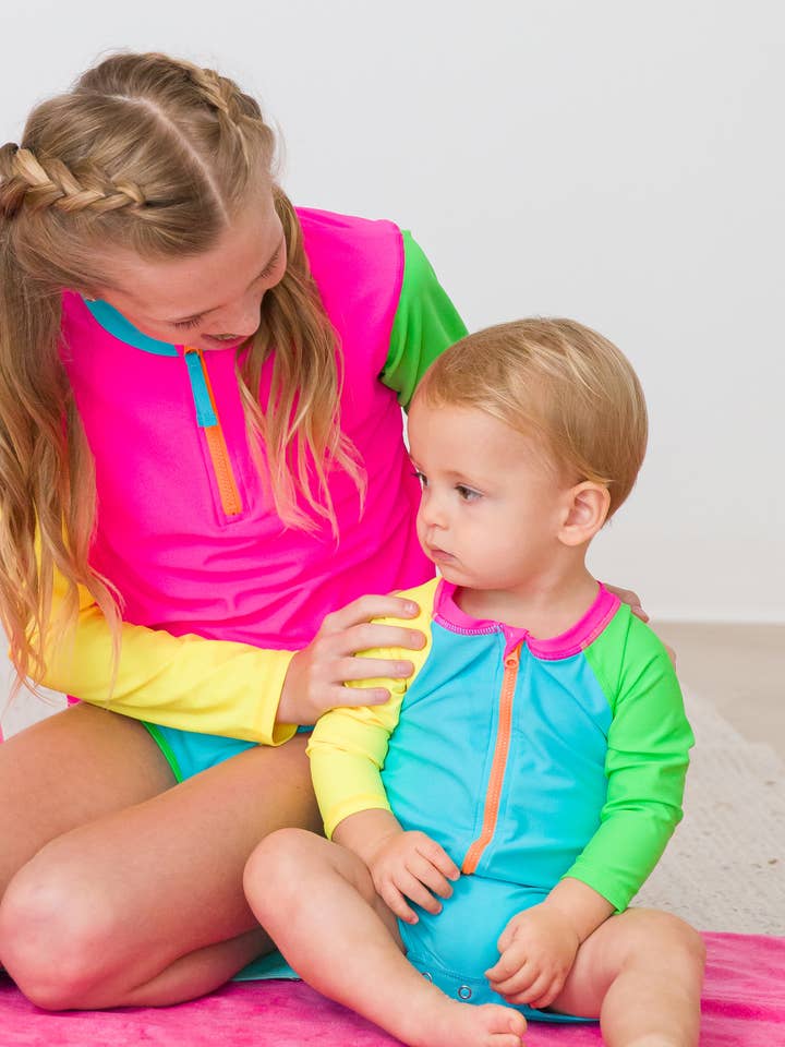 Pink Baby Boys Neon Color Block Long Sleeve One Piece Rash Guard Swimsuit
for wholesale on Faire4