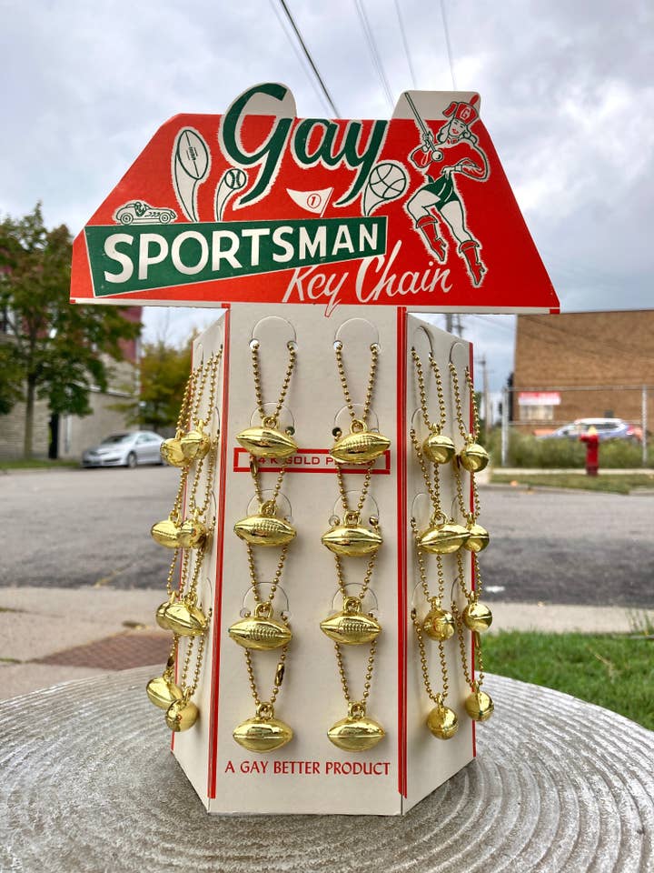 1950s, "Genuine Gay Products" Gay Sportsman Key Chain Store Display! A Guaranteed Gay Product! for wholesale by Nature Girl Industries/Center For Lost Objects