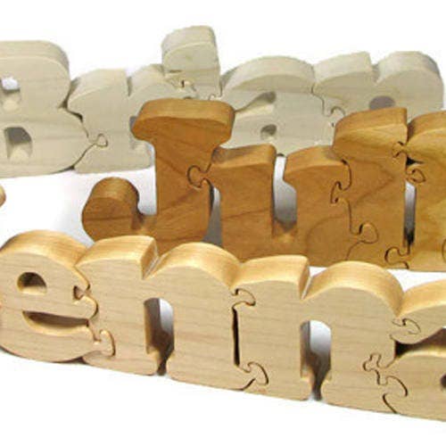 Personalized Wooden Name Puzzle for Newborn Nursery Decor for wholesale by Little Wooden Wonders