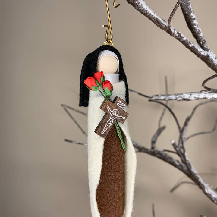 St. Therese of the Child Jesus (St. Therese of Lisieux) Wooden Doll Ornament and other Purchase Wholesale therese. Free Returns & Net 60 Terms on Faire trending on Faire.