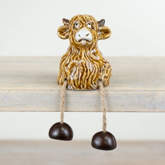 Mucca delle Highland seduta, 7,5 cm per la vendita all'ingrosso da parte di Gainsborough Giftware x Portland Living