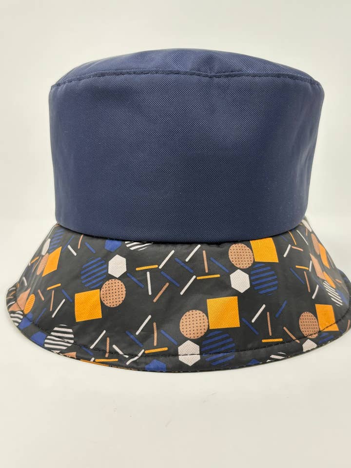Reversible Bucket Rain Hat for wholesale by Kyi Kyi
