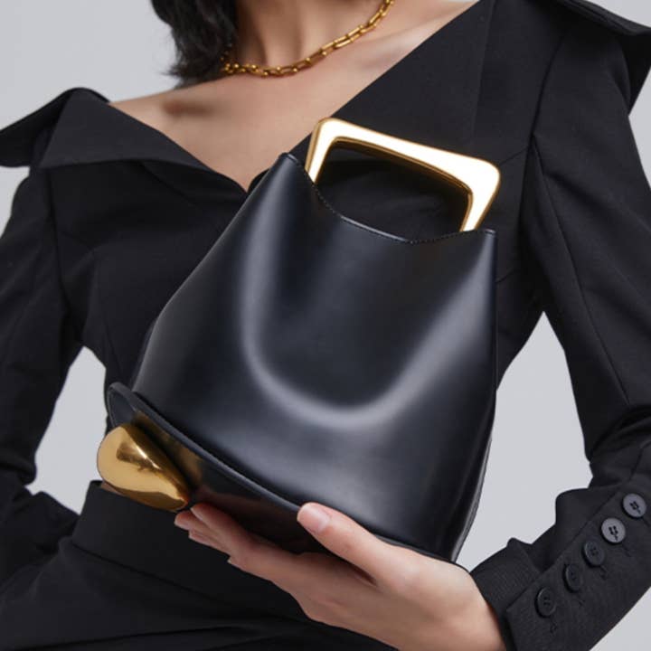 Ozzy Bag - Black & Gold for wholesale on Faire